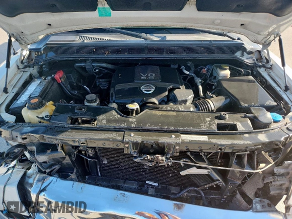 2012 Nissan Titan SV with VIN 1N6BA0ED2CN319597, listed as a Copart auction lot 62016445 with 169,120 mi miles and Salvage title. Bid and sale history available at DreamBid. Image 11.