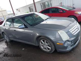 2005 Cadillac STS z VIN 1G6DW677X50185643, wystawiony jako IAAI lot #41730111 z przebiegiem 218 764 mil mil oraz . Historia ofert i sprzedaży dostępna na DreamBid. Obrazek 13.