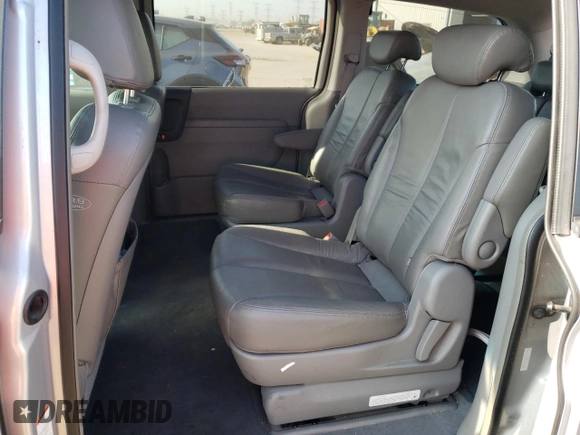2007 Kia Sedona EX with VIN KNDMB233276174639, listed as a Copart auction lot 70691984 with 122,934 mi miles and Salvage Title. Bid and sale history available at carsss.com. Image 10.