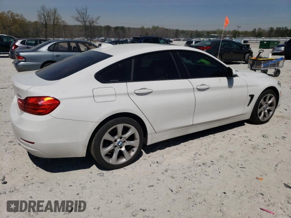 2015 BMW 4 Series 428i xDrive with VIN WBA4A7C50FD415218, listed as a Copart auction lot 50745555 with 139,343 mi miles and Salvage title. Bid and sale history available at DreamBid. Image 3.