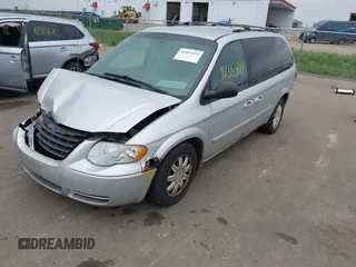 2006 Chrysler Town & Country Touring z VIN 2A4GP54L96R730719, wystawiony jako IAAI lot #42363419 z przebiegiem 186 173 mil mil oraz . Historia ofert i sprzedaży dostępna na DreamBid. Obrazek 17.
