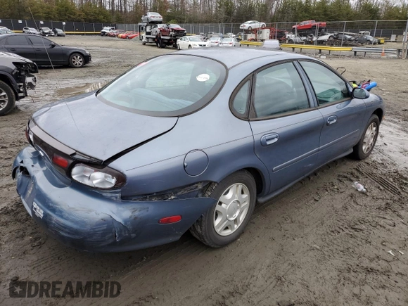 1999 Ford Taurus SE with VIN 1FAFP53U4XG150881, listed as a Copart auction lot 40964564 with 124,928 mi miles and Clean title. Bid and sale history available at DreamBid. Image 3.