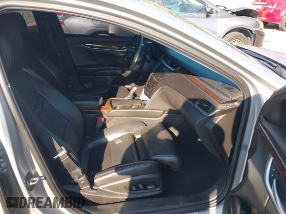 2013 Cadillac XTS Premium z VIN 2G61S5S30D9184910, wystawiony jako IAAI lot #40220419 z przebiegiem 111 330 mil mil oraz . Historia ofert i sprzedaży dostępna na DreamBid. Obrazek 5.
