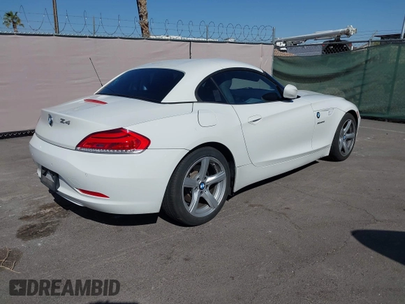 2009 BMW Z4 sDrive30i with VIN WBALM53549E161311, listed as a IAAI auction lot 41985897 with 112,997 mi miles. Bid and sale history available at carsss.com. Image 4.