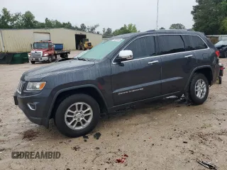2014 Jeep Grand Cherokee Limited with VIN 1C4RJFBG2EC233725, listed as a Copart auction lot 58524505 with 216,798 mi miles and Salvage title. Bid and sale history available at DreamBid. Image 1.