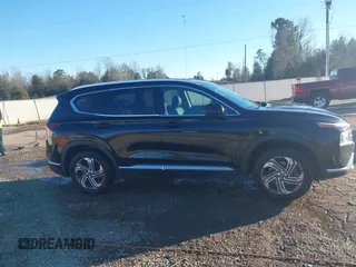 2022 Hyundai Santa Fe SEL with VIN 5NMS24AJXNH375497, listed as a IAAI auction lot 41390349 with 77,067 mi miles and . Bid and sale history available at DreamBid. Image 13.