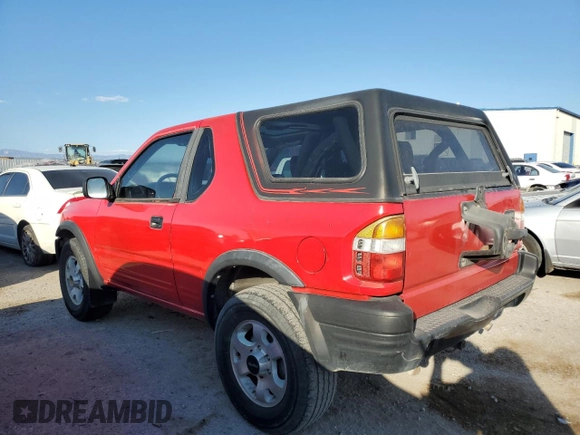 1999 Isuzu Rodeo z VIN 4S2CK57W3X4301044, wystawiony jako Copart lot #75758024 z przebiegiem 209 456 mil mil oraz Czysty tytuł • Clean title. Historia ofert i sprzedaży dostępna na DreamBid. Obrazek 2.