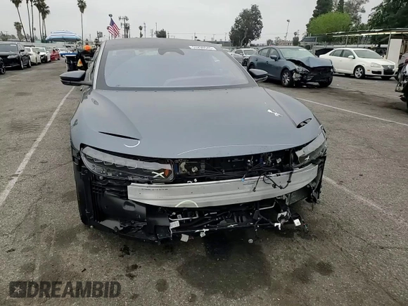 2025 Lucid Air Touring z VIN 50EA1TEA6SA006821, wystawiony jako Copart lot #53298645 z przebiegiem 470 mil mil oraz Szkoda całkowita • Salvage title. Historia ofert i sprzedaży dostępna na DreamBid. Obrazek 11.