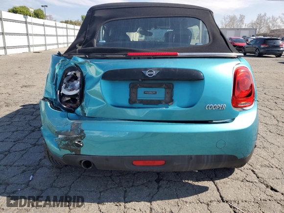 2019 MINI Convertible Cooper z VIN WMWWG5C50K3F79700, wystawiony jako Copart lot #45647955 z przebiegiem 65 168 mil mil oraz Szkoda całkowita • Salvage title. Historia ofert i sprzedaży dostępna na DreamBid. Obrazek 6.