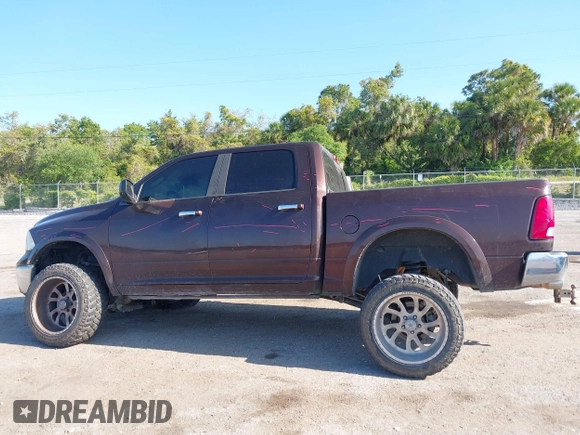 2015 Ram 1500 Big Horn with VIN 3C6RR7LT5FG597847, listed as a IAAI auction lot 42042971 with 212,541 mi miles and . Bid and sale history available at DreamBid. Image 14.