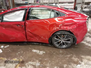 2024 Toyota Prius LE z VIN JTDADABU8R3013976, wystawiony jako IAAI lot #41621800 z przebiegiem 7475 mil mil oraz . Historia ofert i sprzedaży dostępna na DreamBid. Obrazek 17.