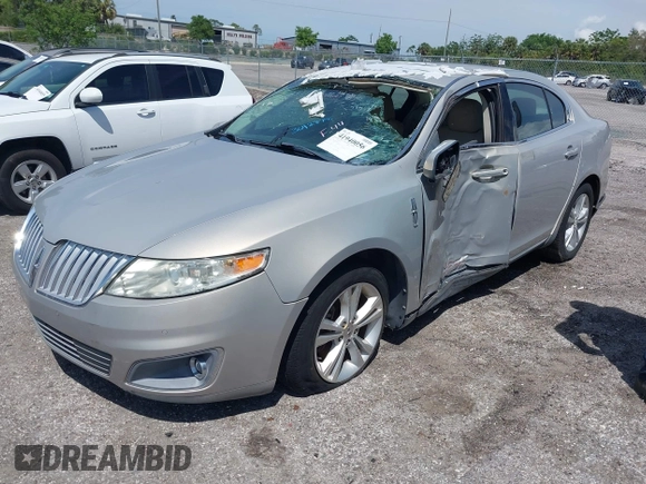 2009 Lincoln MKS с VIN 1LNHM93R59G615147, выставлен на аукционе IAAI как лот 41940056 с пробегом 140 903 миль миль и . История ставок и продаж доступна на DreamBid. Изображение 2.