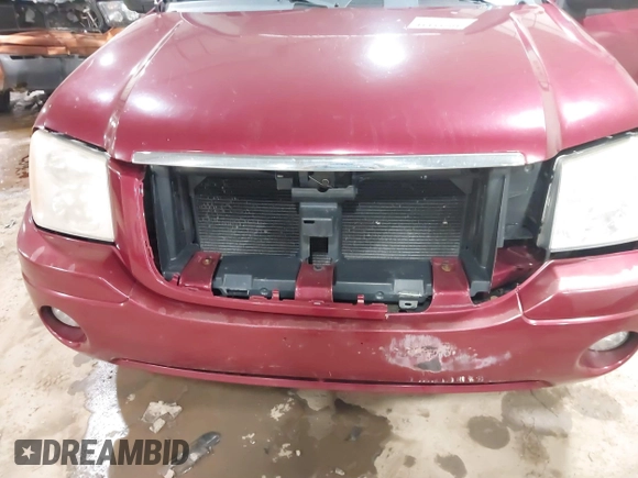 2006 GMC Envoy SLT with VIN 1GKDS13S362135683, listed as a IAAI auction lot 41477501 with 214,760 mi miles. Bid and sale history available at carsss.com. Image 6.