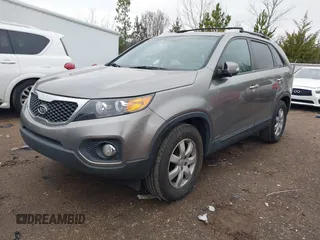 2012 Kia Sorento LX with VIN 5XYKTDA21CG244973, listed as a IAAI auction lot 41268549 with 211,858 mi miles. Bid and sale history available at carsss.com. Image 2.