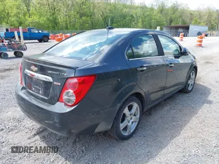 2016 Chevrolet Sonic LTZ z VIN 1G1JE5SB5G4137710, wystawiony jako IAAI lot #42131625 z przebiegiem 152 941 mil mil oraz . Historia ofert i sprzedaży dostępna na DreamBid. Obrazek 4.