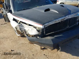 2001 Dodge 2500 z VIN 3B7KC23611G243955, wystawiony jako IAAI lot #41592565 z przebiegiem Nie podano mil oraz . Historia ofert i sprzedaży dostępna na DreamBid. Obrazek 13.