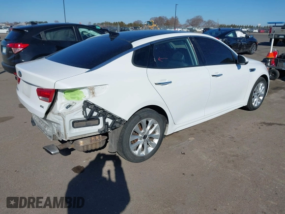 2016 Kia Optima EX with VIN 5XXGU4L32GG032974, listed as a IAAI auction lot 41881338 with 118,590 mi miles. Bid and sale history available at carsss.com. Image 4.
