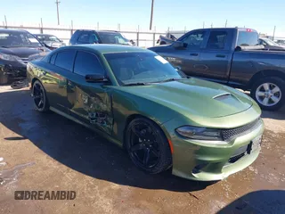 2021 Dodge Charger R/T z VIN 2C3CDXCT7MH584645, wystawiony jako IAAI lot #41603166 z przebiegiem 72 173 mil mil oraz . Historia ofert i sprzedaży dostępna na DreamBid. Obrazek 1.