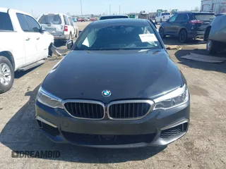 2019 BMW 5 Series M550i xDrive with VIN WBAJB9C51KB464879, listed as a IAAI auction lot 41774834 with 77,379 mi miles and . Bid and sale history available at DreamBid. Image 12.