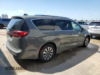 2021 Chrysler Pacifica Hybrid Touring L with VIN 2C4RC1L72MR599413, listed as a Copart auction lot 56419875 with 108,986 mi miles and Salvage title. Bid and sale history available at DreamBid. Image 3.