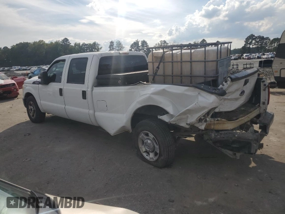2011 Ford F-250 XL with VIN 1FT7W2A60BEC22099, listed as a Copart auction lot 72345524 with 222,042 mi miles and Salvage Title. Bid and sale history available at carsss.com. Image 2.