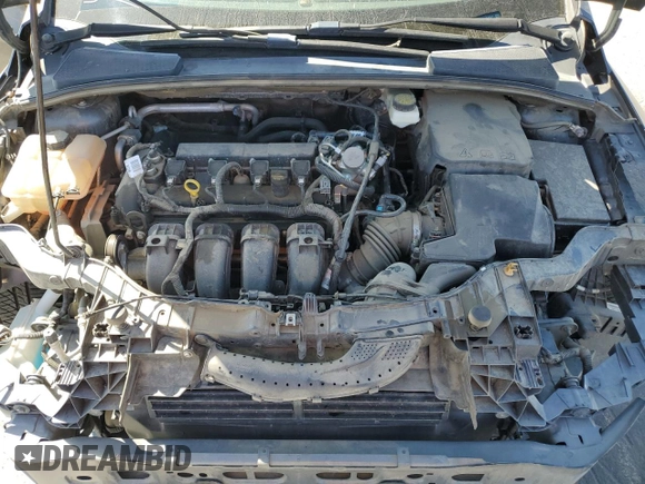 2017 Ford Focus Titanium with VIN 1FADP3J22HL279854, listed as a Copart auction lot 61209135 with 106,323 mi miles and Salvage title. Bid and sale history available at DreamBid. Image 11.