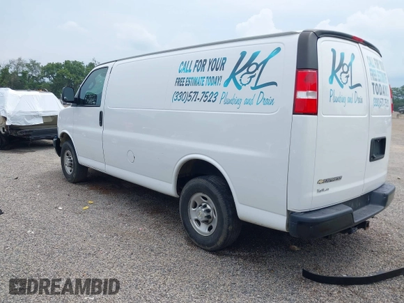 2020 Chevrolet Express Cargo with VIN 1GCWGAFGXL1232667, listed as a IAAI auction lot 42682111 with 90,751 mi miles and . Bid and sale history available at DreamBid. Image 3.