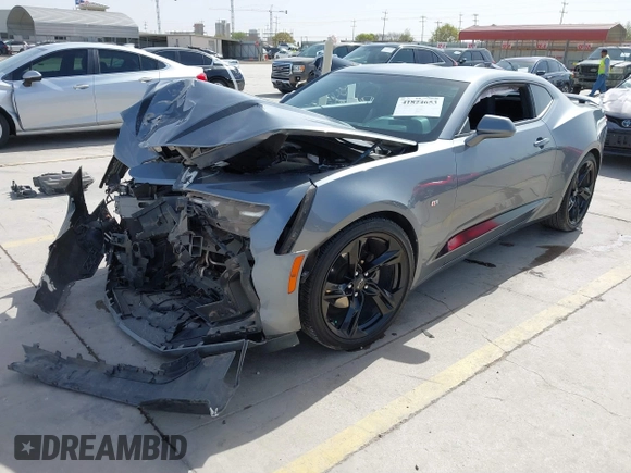 2021 Chevrolet Camaro 1LT z VIN 1G1FB1RX9M0125698, wystawiony jako IAAI lot #41824653 z przebiegiem 69 365 mil mil oraz . Historia ofert i sprzedaży dostępna na DreamBid. Obrazek 2.