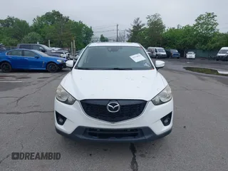 2015 Mazda CX-5 Grand Touring with VIN JM3KE4DY5F0530854, listed as a IAAI auction lot 42274582 with 144,732 mi miles and . Bid and sale history available at DreamBid. Image 12.