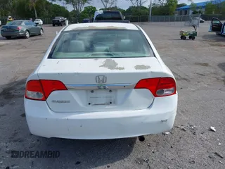 2010 Honda Civic LX with VIN 2HGFA1F54AH533810, listed as a IAAI auction lot 42171253 with 211,551 mi miles and . Bid and sale history available at DreamBid. Image 16.