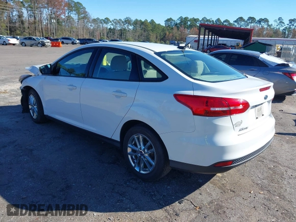2017 Ford Focus SE with VIN 1FADP3F2XHL274975, listed as a IAAI auction lot 38283193 with 77,832 mi miles and . Bid and sale history available at DreamBid. Image 3.