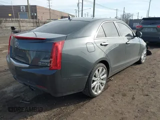 2014 Cadillac ATS Luxury AWD z VIN 1G6AH5RX6E0140302, wystawiony jako IAAI lot #41843454 z przebiegiem 125 388 mil mil oraz . Historia ofert i sprzedaży dostępna na DreamBid. Obrazek 4.