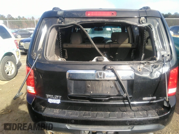 2012 Honda Pilot Touring with VIN 5FNYF3H90CB035309, listed as a IAAI auction lot 41063215 with 228,081 mi miles and . Bid and sale history available at carsss.com. Image 16.