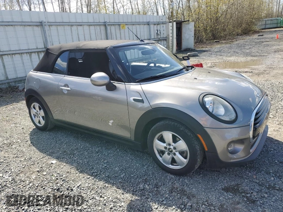 2016 MINI Convertible z VIN WMWWG5C53G3C18887, wystawiony jako Copart lot #51874965 z przebiegiem 78 102 mil mil oraz Szkody całkowita. Historia ofert i sprzedaży dostępna na DreamBid. Obrazek 4.
