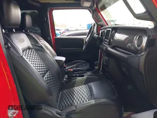 2019 Jeep Wrangler Unlimited Sahara with VIN 1C4HJXEN0KW552028, listed as a IAAI auction lot 41934634 with 53,054 mi miles and . Bid and sale history available at DreamBid. Image 5.