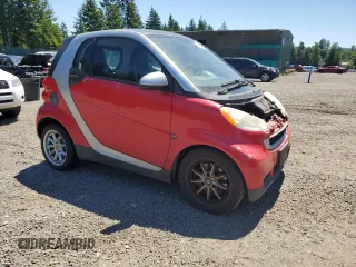 2009 Smart fortwo Pure with VIN WMEEJ31X29K236894, listed as a Copart auction lot 60328875 with 109,337 mi miles and Clean title. Bid and sale history available at DreamBid. Image 4.