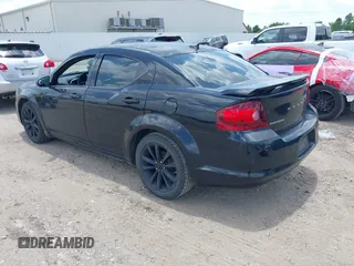2014 Dodge Avenger SE with VIN 1C3CDZAG3EN104594, listed as a IAAI auction lot 42561392 with 129,208 mi miles and . Bid and sale history available at DreamBid. Image 3.