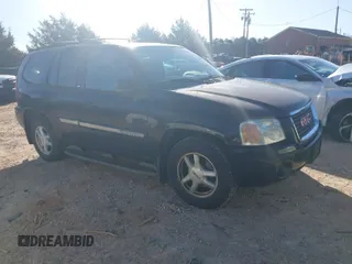 2002 GMC Envoy SLT with VIN 1GKDS13SX22440026, listed as a IAAI auction lot 41716249 with 179,141 mi miles. Bid and sale history available at carsss.com. Image 1.