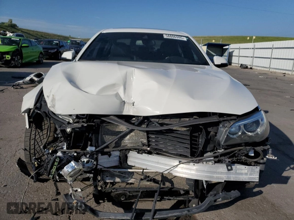 2016 BMW 5 Series 535i xDrive with VIN WBA5B3C55GG260630, listed as a Copart auction lot 58806995 with 72,028 mi miles and Salvage title. Bid and sale history available at DreamBid. Image 5.