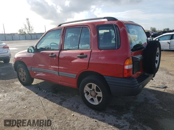2003 Chevrolet Tracker with VIN 2CNBE13CX36943395, listed as a Copart auction lot 70964574 with 118,975 mi miles and Salvage title. Bid and sale history available at DreamBid. Image 2.