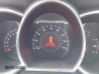 2013 Kia Optima LX z VIN KNAGM4A79D5380077, wystawiony jako IAAI lot #42286648 z przebiegiem 97 152 mil mil oraz . Historia ofert i sprzedaży dostępna na DreamBid. Obrazek 7.