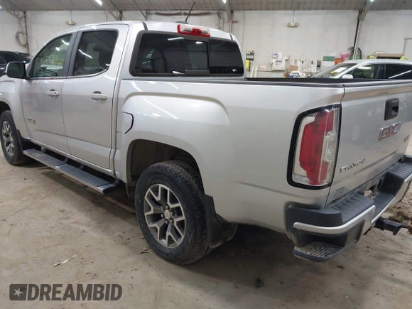 2015 GMC Canyon 4WD SLE z VIN 1GTG6BE39F1252926, wystawiony jako IAAI lot #42128396 z przebiegiem 113 139 mil mil oraz . Historia ofert i sprzedaży dostępna na DreamBid. Obrazek 3.