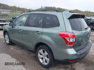 2016 Subaru Forester Limited with VIN JF2SJARCXGH406079, listed as a IAAI auction lot 41974522 with 64,910 mi miles and . Bid and sale history available at DreamBid. Image 3.