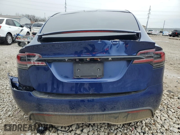 2023 Tesla Model X with VIN 7SAXCDE51PF415778, listed as a Copart auction lot 51792205 with Not Provided miles and Salvage Title. Bid and sale history available at DreamBid. Image 6.