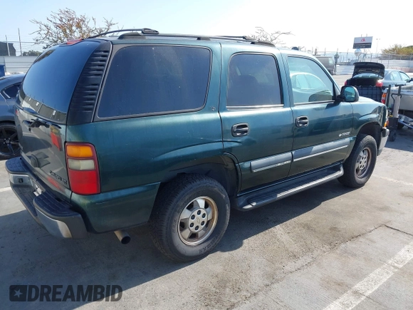 2002 Chevrolet Tahoe LS with VIN 1GNEC13V12R166916, listed as a IAAI auction lot 42393123 with 228,687 mi miles and . Bid and sale history available at DreamBid. Image 4.