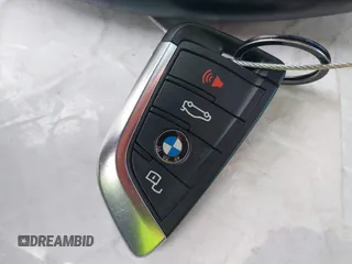2022 BMW 4 Series M440i with VIN WBA53AT02NCJ20674, listed as a IAAI auction lot 41200398 with 28,235 mi miles and . Bid and sale history available at DreamBid. Image 11.