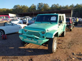2010 Jeep Wrangler Unlimited Sport with VIN 1J4BA3H15AL166397, listed as a IAAI auction lot 41391376 with 87,091 mi miles. Bid and sale history available at carsss.com. Image 6.
