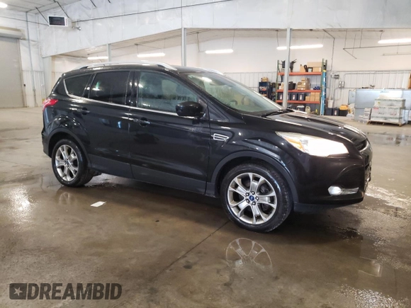 2014 Ford Escape Titanium with VIN 1FMCU9J9XEUE45988, listed as a Copart auction lot 56066175 with 228,872 mi miles and Clean Title. Bid and sale history available at DreamBid. Image 4.