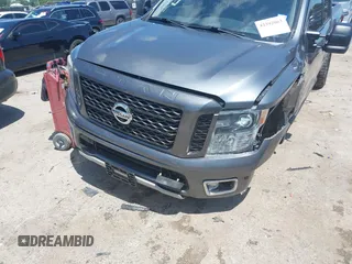 2017 Nissan Titan SV z VIN 1N6AA1E55HN551578, wystawiony jako IAAI lot #42392063 z przebiegiem 123 077 mil mil oraz . Historia ofert i sprzedaży dostępna na DreamBid. Obrazek 6.