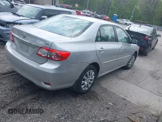 2013 Toyota Corolla L with VIN 2T1BU4EEXDC052854, listed as a IAAI auction lot 42230118 with 156,120 mi miles and . Bid and sale history available at DreamBid. Image 4.